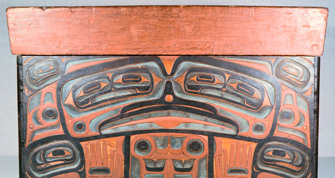 close up of a large carved Haida bentwood box