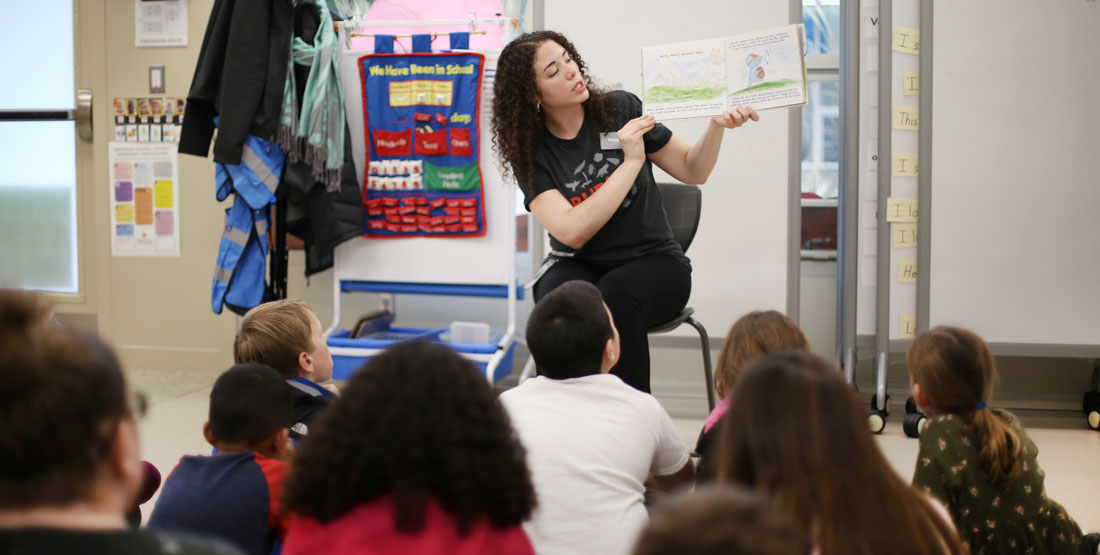 burke educator reads to students