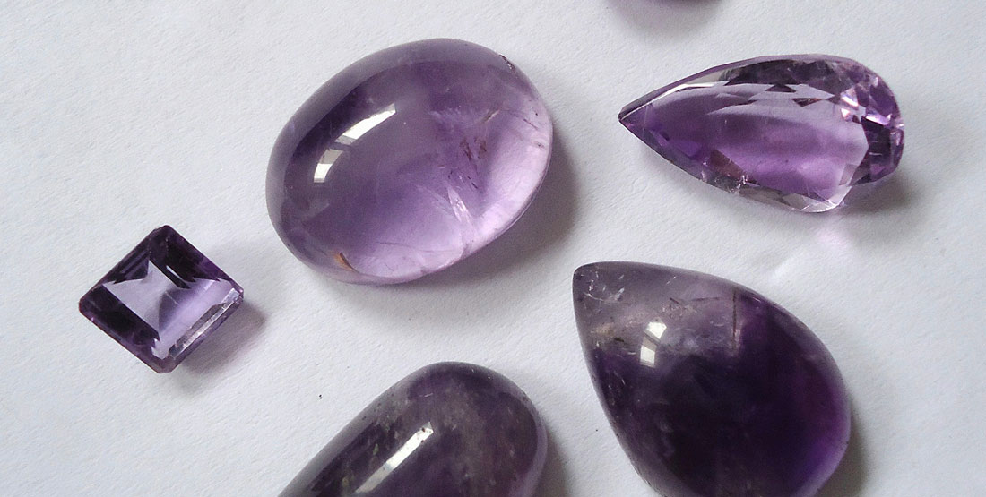 small pieces of cut and polished purple amethyst