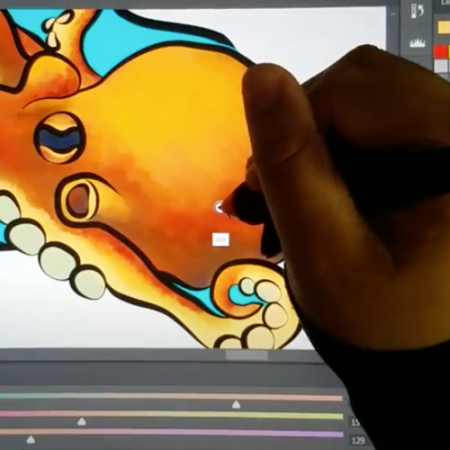 a hand colors an octopus digitally