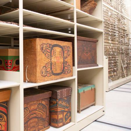 bentwood boxes on shelves in the collection space