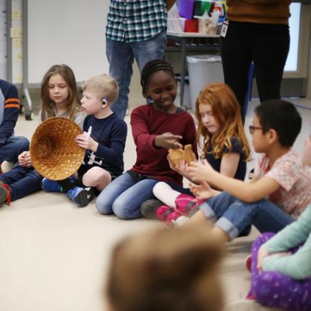 students interact with the Storytellers program