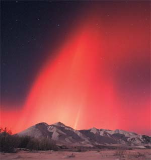 Northern Lights: Rare occurrence of red northern lights. Photo by Subhankar Banerjee. Photos were taken between March 2001 through Fall 2002.