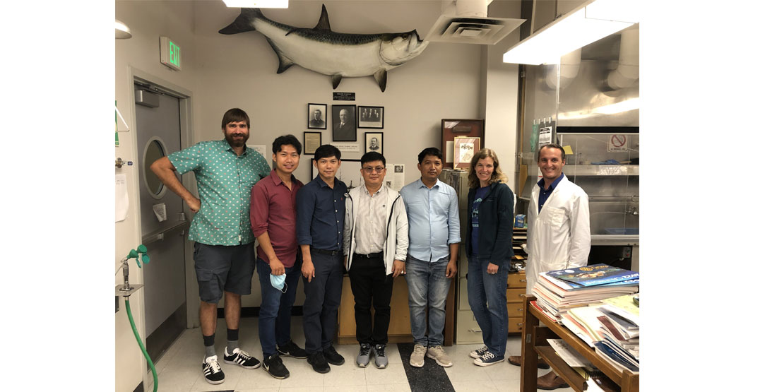 A group photo of Dr. Gordon Holtgrieve, Kakada Pin, Sophorn Uy , Dr. Peng Bun Ngor, Samol Chhuoy, Katherine Maslenikov, and Dr. Luke Tornabene.