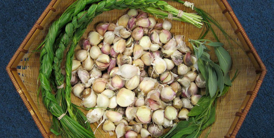 wild garlic and onions in a woven basket