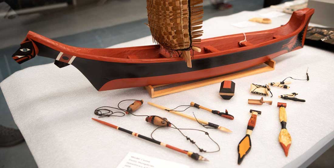 model canoe and cedar bark sail