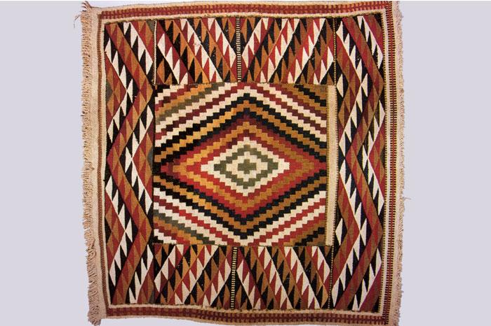 A decorative mountain goat wool robe