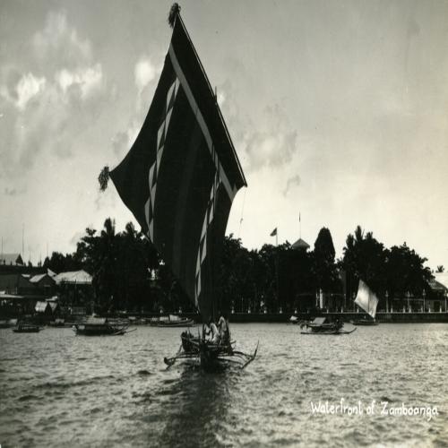 black and white photograph of a boat on the water