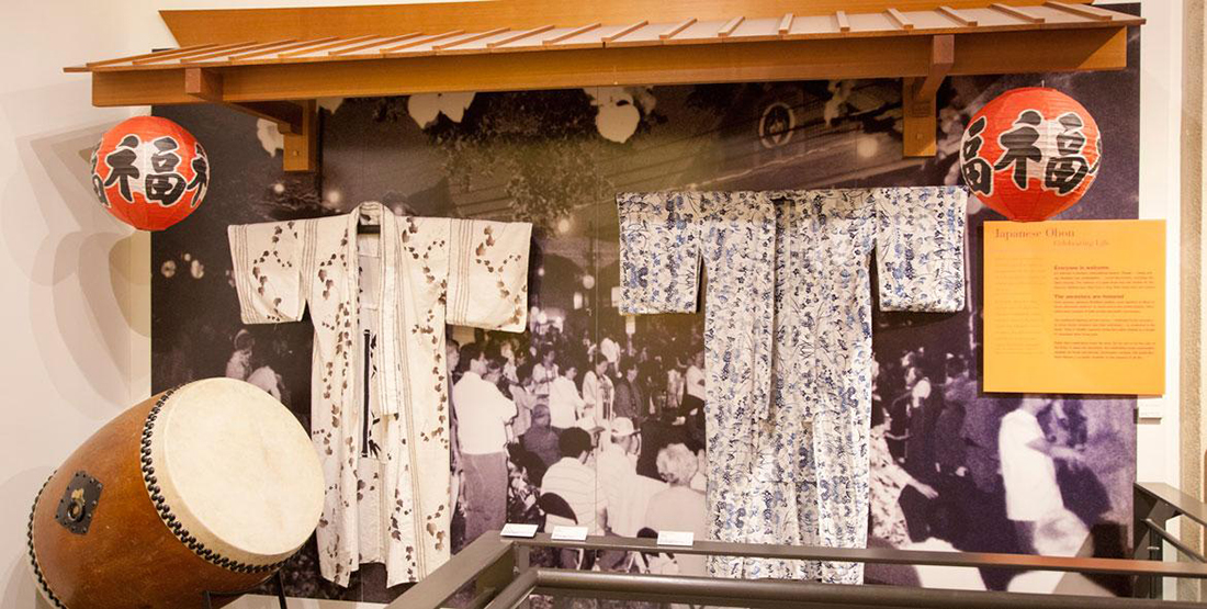 A museum display of traditional Japanese clothing and drums