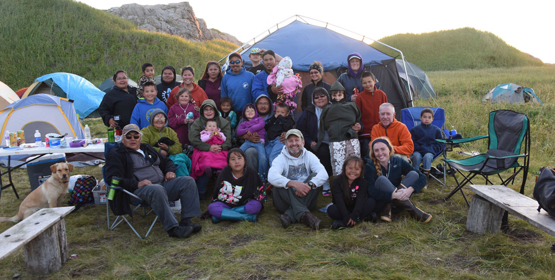 A group of community members posing for a photo