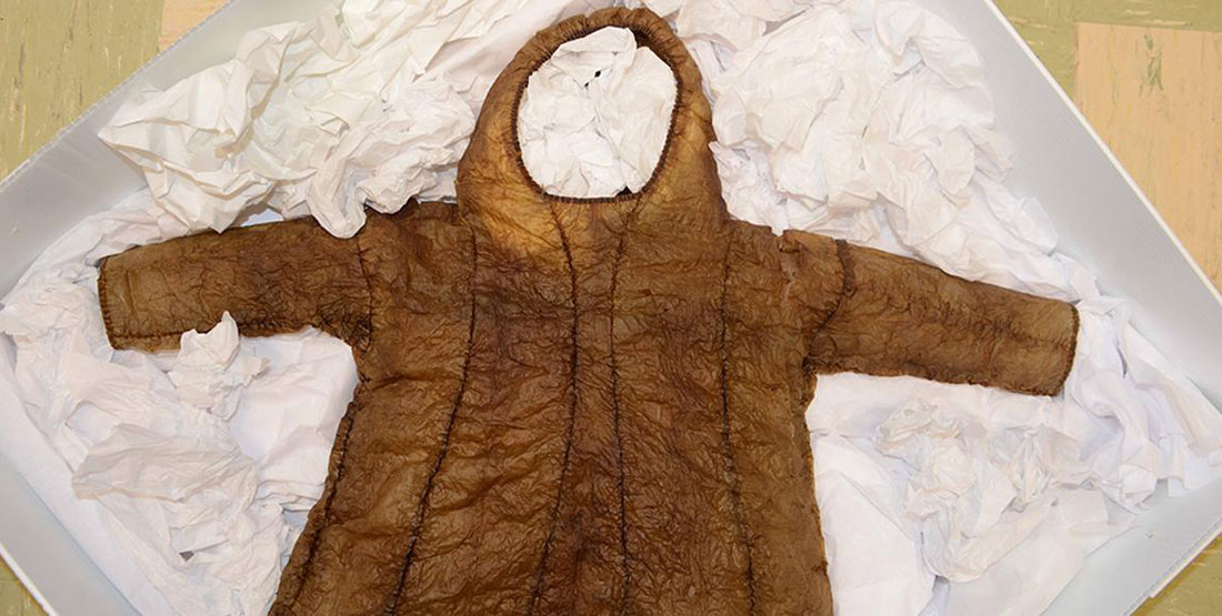 A children's jacket with a hood made from bear gut