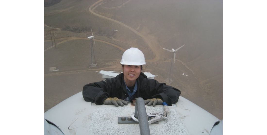 han tran works at the top of a wind turbine