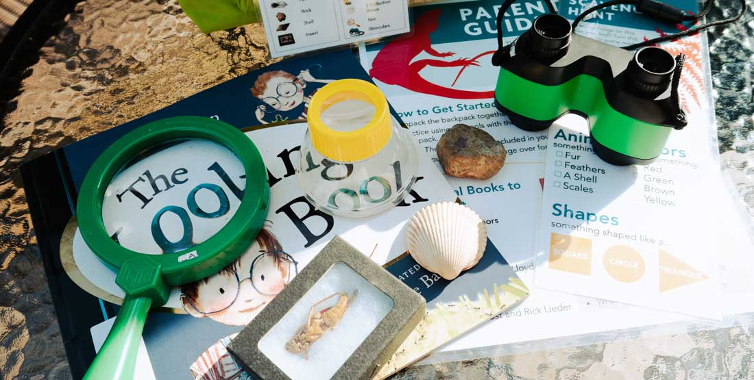 burke backyard scientist backpack contents on a glass tabletop