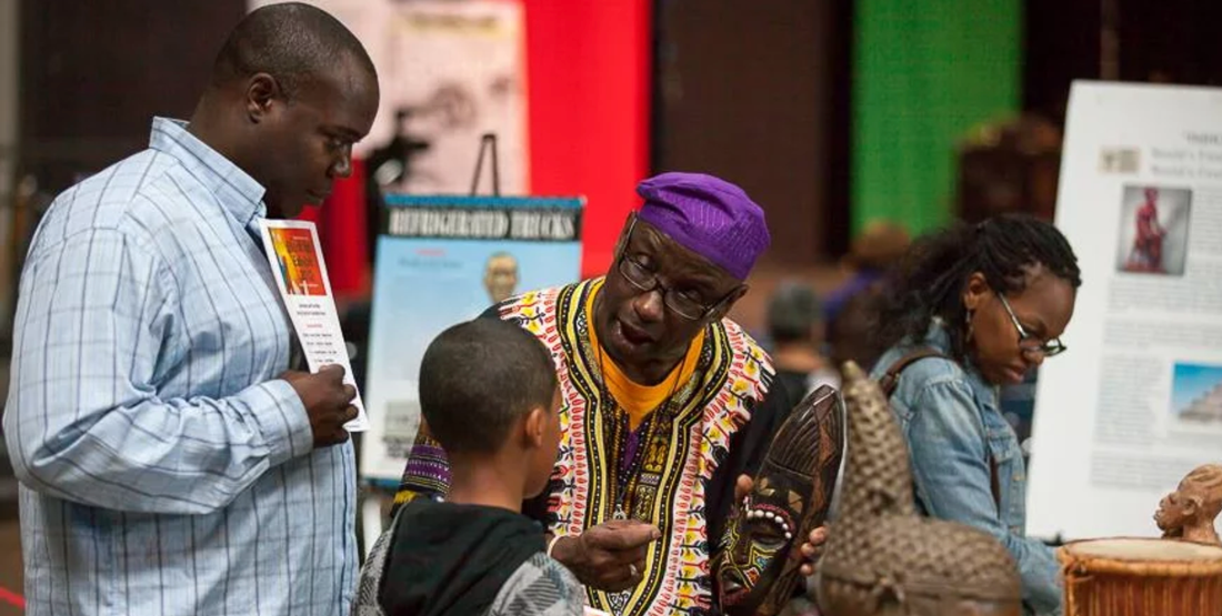 people interact with The Unspoken Truths Traveling Museum