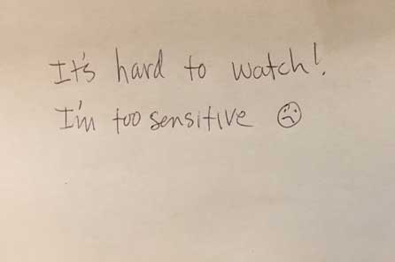 A handwritten note saying "It's hard to watch! I'm too sensitive."