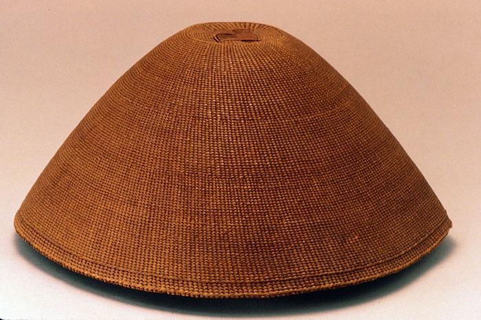 A woven domed hat made of cedar bark