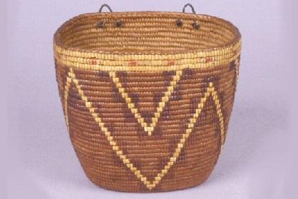A coiled basket with diamond patterns