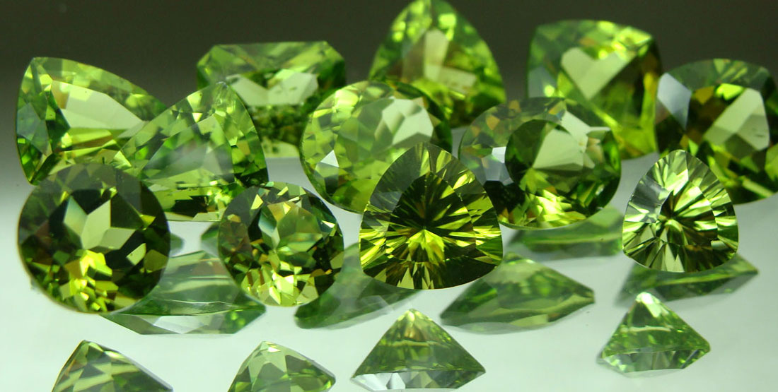 A group of cut and polished peridot