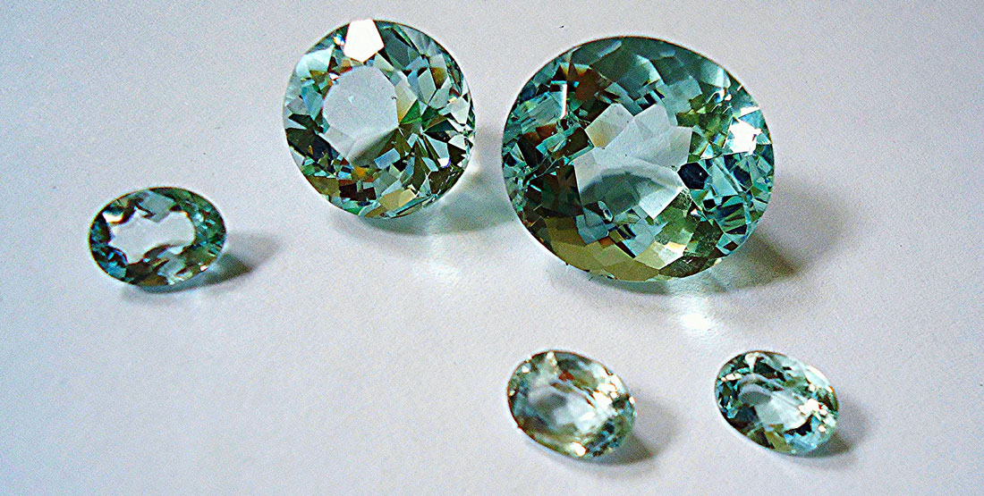 cut and polished aquamarine pieces