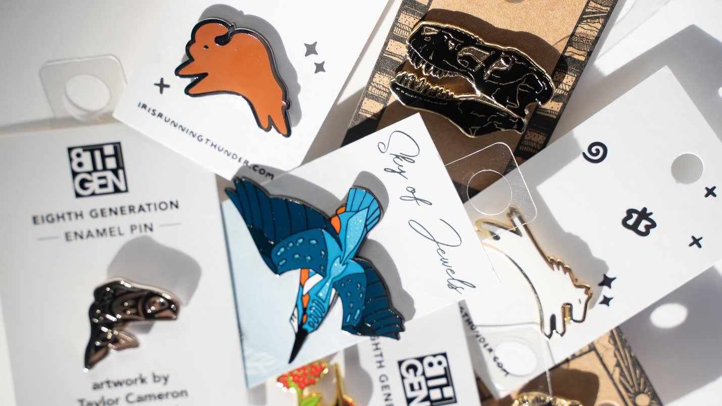 flat lay of enamel pins