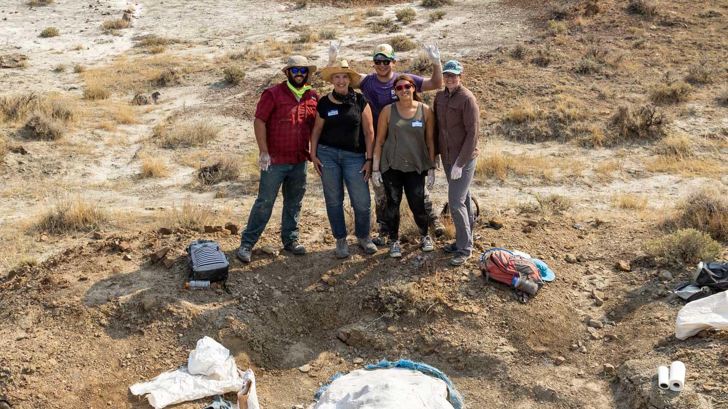 DIG Field School participants pose in the field