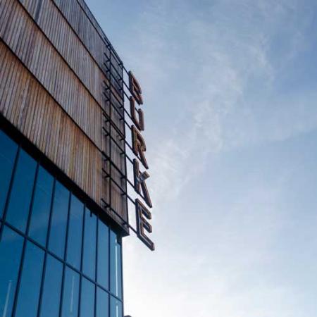 BURKE sign on the exterior of the Burke Museum on a bright sunny winter day