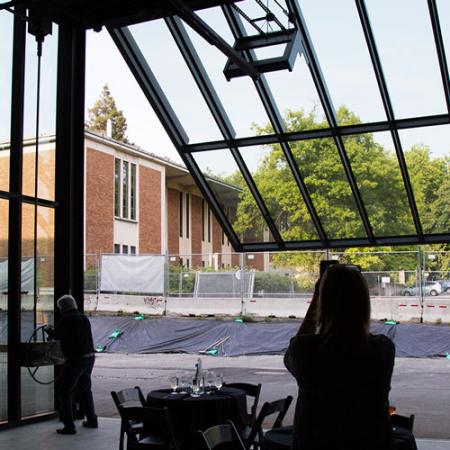 A view of the pivoting window wall opening from the inside of the museum