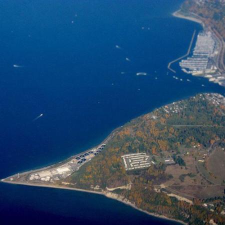 aerial view of a piece of land sticking out into puget sound