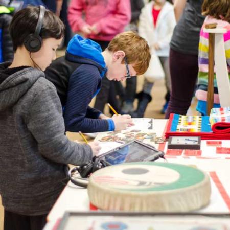 kids interact with living traditions program