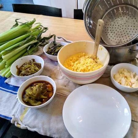 ingredients for tamales spread out on a table