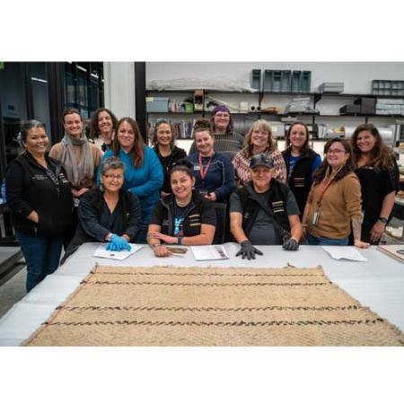 group photo of woven in wool co-curators in the arts & cultures workroom