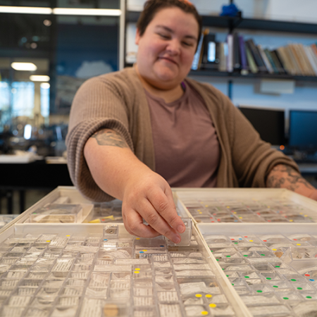 Visiting researcher Deanna Flores at the Burke Museum paleontology lab 
