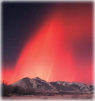 Northern Lights: Rare occurrence of red northern lights. Photo by Subhankar Banerjee. Photos were taken between March 2001 through Fall 2002.